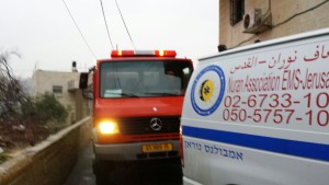 Fire and ambulance helping the family whose house collapsed in the Old City