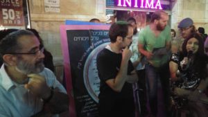 Religious, secular, Haredi Jews discussing the Pride Parade